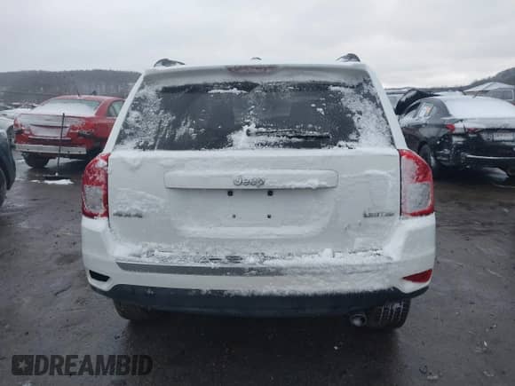 2013 Jeep Compass Limited z VIN 1C4NJDCB6DD166562, wystawiony jako IAAI lot #41059717 z przebiegiem 91 188 mil mil oraz . Historia ofert i sprzedaży dostępna na DreamBid. Obrazek 16.