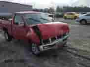 1996 Nissan Frontier XE with VIN 1N6SD11SXTC314306, listed as a Copart auction lot 65680205 with 63,809 mi miles and Salvage title. Bid and sale history available at DreamBid. Image 13.