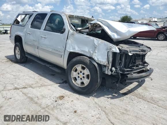 2012 Chevrolet Suburban LT с VIN 1GNSCJE00CR130379, выставлен на аукционе Copart как лот 64384725 с пробегом 249 562 миль миль и На запчасти • Non repairable. История ставок и продаж доступна на DreamBid. Изображение 4.