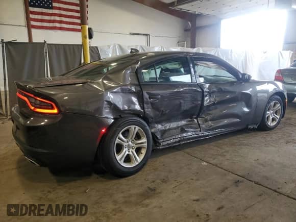 2023 Dodge Charger SXT with VIN 2C3CDXBG0PH559496, listed as a Copart auction lot 84555365 with 64,436 mi miles and Salvage title. Bid and sale history available at DreamBid. Image 3.