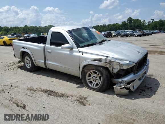 2002 Dodge Dakota z VIN 1B7FL16X12S692630, wystawiony jako Copart lot #66768875 z przebiegiem 135 930 mil mil oraz Szkoda całkowita • Salvage title. Historia ofert i sprzedaży dostępna na DreamBid. Obrazek 4.
