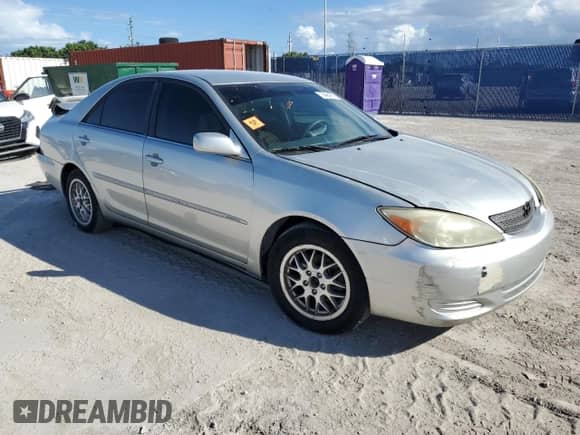 2002 Toyota Camry XLE z VIN 4T1BE32K12U562006, wystawiony jako Copart lot #84642915 z przebiegiem Nie podano mil oraz Szkoda całkowita • Salvage title. Historia ofert i sprzedaży dostępna na DreamBid. Obrazek 4.