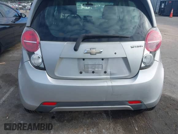 2015 Chevrolet Spark LT z VIN KL8CD6S90FC732385, wystawiony jako IAAI lot #43377570 z przebiegiem 119 527 mil mil oraz . Historia ofert i sprzedaży dostępna na DreamBid. Obrazek 6.