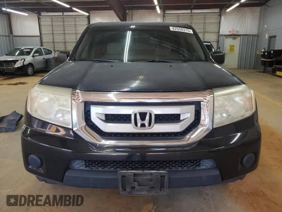 2011 Honda Pilot LX с VIN 5FNYF3H20BB031813, выставлен на аукционе Copart как лот 82650315 с пробегом 279 751 миль миль и Списание • Salvage title. История ставок и продаж доступна на DreamBid. Изображение 5.