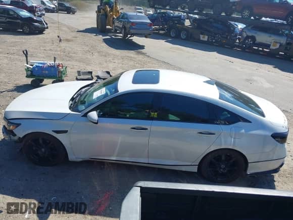 2018 Honda Accord Touring with VIN 1HGCV2F9XJA017191, listed as a IAAI auction lot 43094985 with 119,487 mi miles and . Bid and sale history available at DreamBid. Image 15.