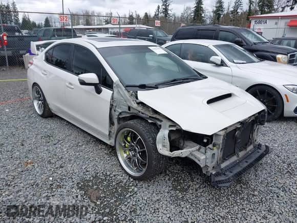 2018 Subaru WRX STI Limited z VIN JF1VA2W63J9831795, wystawiony jako IAAI lot #41923446 z przebiegiem 112 927 mil mil oraz . Historia ofert i sprzedaży dostępna na DreamBid. Obrazek 1.