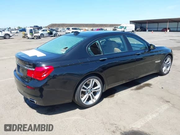 2011 BMW 7 Series 750Li with VIN WBAKB8C5XBCY64531, listed as a IAAI auction lot 42350009 with 113,893 mi miles and . Bid and sale history available at DreamBid. Image 4.