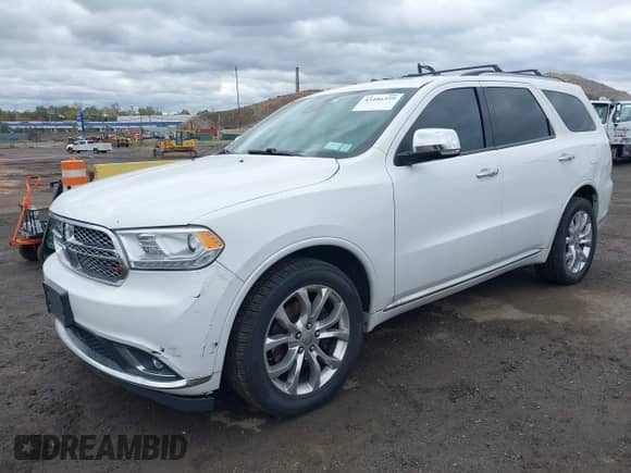 2016 Dodge Durango Citadel with VIN 1C4RDJEG9GC309126, listed as a IAAI auction lot 43486359 with 111,264 mi miles and . Bid and sale history available at DreamBid. Image 2.