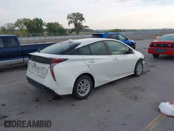 2016 Toyota Prius Two z VIN JTDKBRFU2G3522042, wystawiony jako IAAI lot #43234763 z przebiegiem 89 388 mil mil oraz . Historia ofert i sprzedaży dostępna na DreamBid. Obrazek 4.