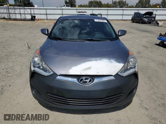 2016 Hyundai Veloster z VIN KMHTC6AD9GU299687, wystawiony jako Copart lot #71261925 z przebiegiem 141 688 mil mil oraz Czysty tytuł • Clean title. Historia ofert i sprzedaży dostępna na DreamBid. Obrazek 5.