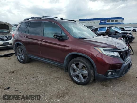 2019 Honda Passport Touring z VIN 5FNYF8H97KB016820, wystawiony jako Copart lot #61562855 z przebiegiem 41 772 mil mil oraz Szkoda całkowita • Salvage title. Historia ofert i sprzedaży dostępna na DreamBid. Obrazek 4.