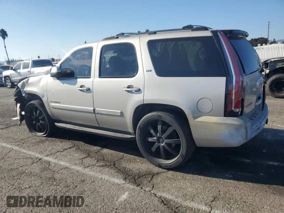2007 Chevrolet Tahoe LTZ с VIN 1GNFC13087R104249, выставлен на аукционе Copart как лот 80617975 с пробегом 247 076 миль миль и Списание • Salvage title. История ставок и продаж доступна на DreamBid. Изображение 2.