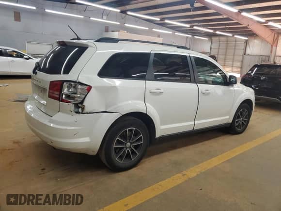 2017 Dodge Journey SE с VIN 3C4PDCAB7HT683978, выставлен на аукционе Copart как лот 86801175 с пробегом 114 233 миль миль и Чистый • Clean title. История ставок и продаж доступна на DreamBid. Изображение 3.