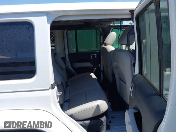 2021 Jeep Wrangler Unlimited Sahara z VIN 1C4JJXP68MW716328, wystawiony jako IAAI lot #42200779 z przebiegiem Nie podano mil oraz . Historia ofert i sprzedaży dostępna na DreamBid. Obrazek 8.