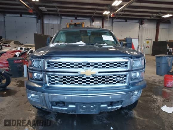 2014 Chevrolet Silverado 1500 LTZ z VIN 1GCVKSEJ2EZ312286, wystawiony jako IAAI lot #41496345 z przebiegiem 76 747 mil mil oraz . Historia ofert i sprzedaży dostępna na DreamBid. Obrazek 13.