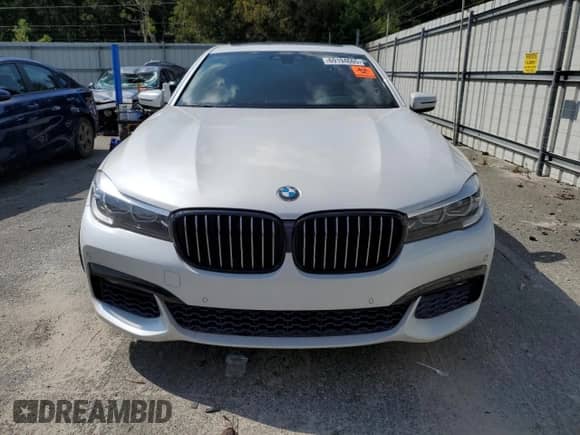 2018 BMW 7 Series 740i с VIN WBA7E2C57JG741724, выставлен на аукционе Copart как лот 69194665 с пробегом 85 919 миль миль и Чистый • Clean title. История ставок и продаж доступна на DreamBid. Изображение 5.