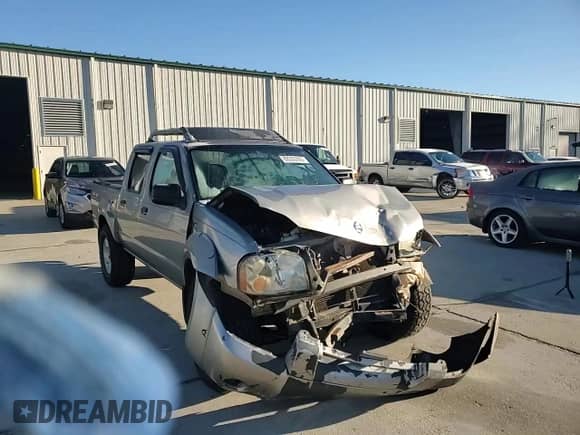 2002 Nissan Frontier SVE with VIN 1N6MD27Y22C389865, listed as a Copart auction lot 89300285 with 196,212 mi miles and Salvage title. Bid and sale history available at DreamBid. Image 11.
