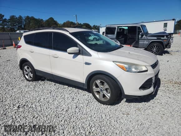 2014 Ford Escape SE с VIN 1FMCU0GX9EUA50671, выставлен на аукционе Copart как лот 89681825 с пробегом 107 150 миль миль и Списание • Salvage title. История ставок и продаж доступна на DreamBid. Изображение 4.