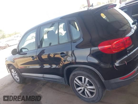 2014 Volkswagen Tiguan SEL with VIN WVGAV3AX9EW625726, listed as a IAAI auction lot 42401853 with 145,082 mi miles and . Bid and sale history available at DreamBid. Image 15.