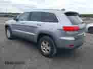 2014 Jeep Grand Cherokee Laredo z VIN 1C4RJFAG0EC251156, wystawiony jako IAAI lot #43428557 z przebiegiem 175 570 mil mil oraz . Historia ofert i sprzedaży dostępna na DreamBid. Obrazek 3.