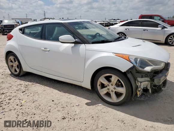 2014 Hyundai Veloster с VIN KMHTC6ADXEU211016, выставлен на аукционе Copart как лот 65572325 с пробегом 144 191 миль миль и Списание • Salvage title. История ставок и продаж доступна на DreamBid. Изображение 4.