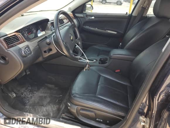 2012 Chevrolet Impala LTZ z VIN 2G1WC5E32C1213194, wystawiony jako Copart lot #67763315 z przebiegiem 106 856 mil mil oraz Szkoda całkowita • Salvage title. Historia ofert i sprzedaży dostępna na DreamBid. Obrazek 7.