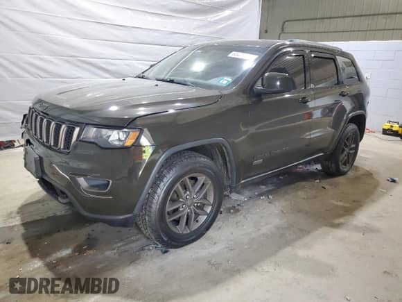 2016 Jeep Grand Cherokee 75th Anniversary with VIN 1C4RJFAG7GC395998, listed as a Copart auction lot 60479415 with 123,619 mi miles and Salvage title. Bid and sale history available at DreamBid. Image 1.