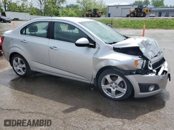 2013 Chevrolet Sonic LTZ с VIN 1G1JE5SG5D4217581, выставлен на аукционе Copart как лот 55977985 с пробегом 49 601 миль миль и Списание • Salvage title. История ставок и продаж доступна на DreamBid. Изображение 4.
