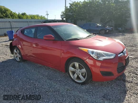 2013 Hyundai Veloster w/Black Int z VIN KMHTC6AD2DU126699, wystawiony jako Copart lot #57329805 z przebiegiem 85 303 mil mil oraz Szkoda całkowita • Salvage title. Historia ofert i sprzedaży dostępna na DreamBid. Obrazek 4.