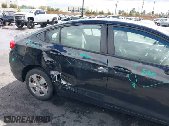 2018 Chevrolet Cruze LS z VIN 1G1BB5SM2J7150497, wystawiony jako IAAI lot #41784487 z przebiegiem 102 927 mil mil oraz . Historia ofert i sprzedaży dostępna na DreamBid. Obrazek 6.