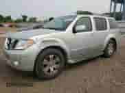 2011 Nissan Pathfinder Silver with VIN 5N1AR1NB3BC614600, listed as a Copart auction lot 58237445 with 124,697 mi miles and Salvage title. Bid and sale history available at DreamBid. Image 1.
