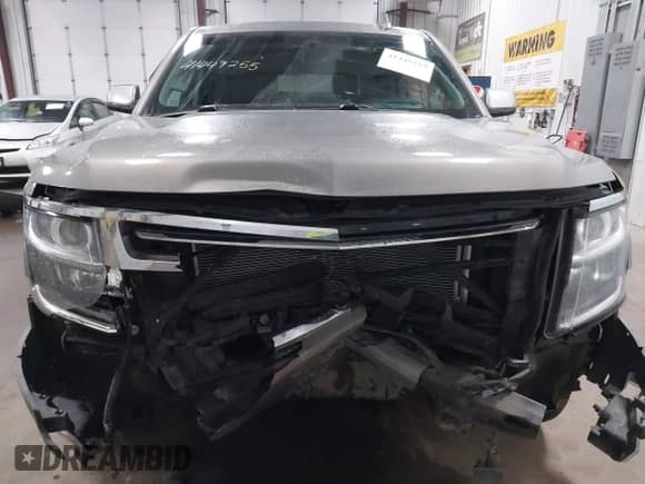 2018 Chevrolet Suburban Premier z VIN 1GNSKJKC9JR100134, wystawiony jako IAAI lot #41449255 z przebiegiem 111 528 mil mil oraz . Historia ofert i sprzedaży dostępna na DreamBid. Obrazek 12.