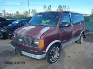 1989 Chevrolet Astro z VIN 1GNDM15Z5KB191240, wystawiony jako IAAI lot #43510487 z przebiegiem 50 773 mil mil oraz . Historia ofert i sprzedaży dostępna na DreamBid. Obrazek 2.