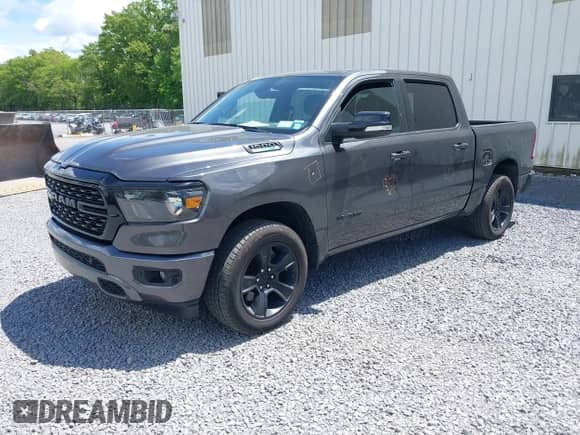 2022 Ram 1500 Big Horn z VIN 1C6RRFFG4NN379347, wystawiony jako IAAI lot #42377532 z przebiegiem 64 311 mil mil oraz . Historia ofert i sprzedaży dostępna na DreamBid. Obrazek 2.