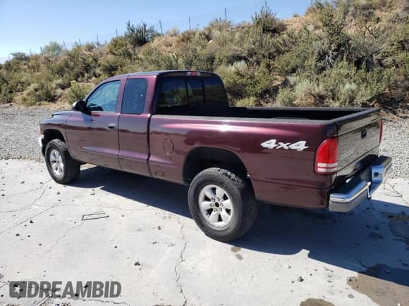 2004 Dodge Dakota SLT z VIN 1D7HG42N24S691756, wystawiony jako Copart lot #68787765 z przebiegiem 142 437 mil mil oraz Szkoda całkowita • Salvage title. Historia ofert i sprzedaży dostępna na DreamBid. Obrazek 2.