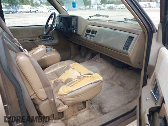 1994 Chevrolet Suburban with VIN 1GNEC16K7RJ436015, listed as a IAAI auction lot 41739287 with 285,425 mi miles and . Bid and sale history available at DreamBid. Image 5.