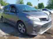 2018 Toyota Sienna L with VIN 5TDZZ3DCXJS910093, listed as a IAAI auction lot 42821908 with 98,729 mi miles and . Bid and sale history available at DreamBid. Image 1.