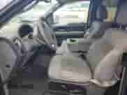 2005 Ford F-150 XLT with VIN 1FTPX12595NA46140, listed as a Copart auction lot 82141515 with 156,879 mi miles and Salvage title. Bid and sale history available at DreamBid. Image 7.