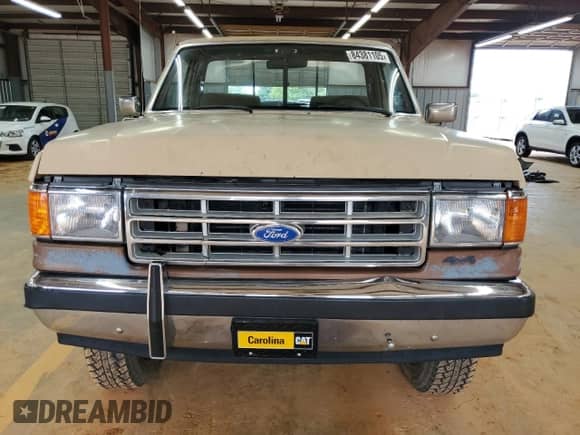 1988 Ford F-150 z VIN 1FTEF14N2JNB50809, wystawiony jako Copart lot #84381105 z przebiegiem 17 890 mil mil oraz Szkoda całkowita • Salvage title. Historia ofert i sprzedaży dostępna na DreamBid. Obrazek 5.