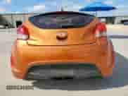 2013 Hyundai Veloster w/Black Int z VIN KMHTC6AD8DU118235, wystawiony jako Copart lot #81145875 z przebiegiem 164 057 mil mil oraz Szkoda całkowita • Salvage title. Historia ofert i sprzedaży dostępna na DreamBid. Obrazek 6.