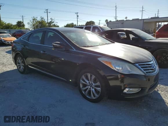 2014 Hyundai Azera с VIN KMHFG4JG1EA376731, выставлен на аукционе Copart как лот 82719105 с пробегом 224 572 миль миль и Чистый • Clean title. История ставок и продаж доступна на DreamBid. Изображение 4.