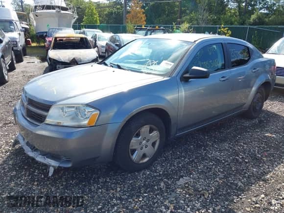2009 Dodge Avenger SE with VIN 1B3LC46B89N538760, listed as a IAAI auction lot 43156921 with Not provided miles and . Bid and sale history available at DreamBid. Image 2.