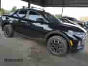 2022 Hyundai Santa Cruz SEL с VIN 5NTJC4AE7NH038480, выставлен на аукционе Copart как лот 69509224 с пробегом 5 786 миль миль и Списание • Salvage title. История ставок и продаж доступна на DreamBid. Изображение 4.