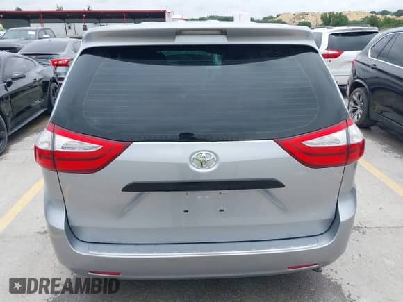 2015 Toyota Sienna L with VIN 5TDZK3DC6FS673338, listed as a IAAI auction lot 42497655 with 158,216 mi miles and . Bid and sale history available at DreamBid. Image 16.