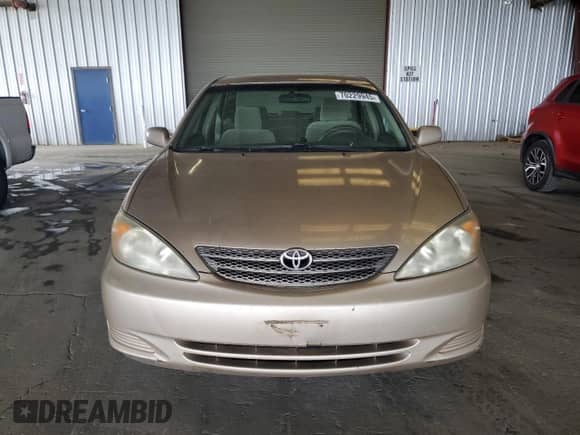 2002 Toyota Camry LE с VIN 4T1BE32K32U005811, выставлен на аукционе Copart как лот 70229945 с пробегом 209 472 миль миль и Чистый • Clean title. История ставок и продаж доступна на DreamBid. Изображение 5.