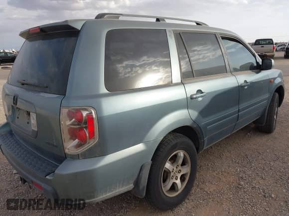 2006 Honda Pilot EX z VIN 2HKYF18416H561415, wystawiony jako IAAI lot #41887651 z przebiegiem 249 480 mil mil oraz . Historia ofert i sprzedaży dostępna na DreamBid. Obrazek 4.