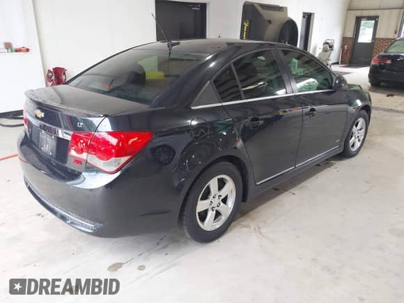 2013 Chevrolet Cruze 1LT with VIN 1G1PD5SB2D7108074, listed as a IAAI auction lot 42794088 with 193,773 mi miles and . Bid and sale history available at DreamBid. Image 4.