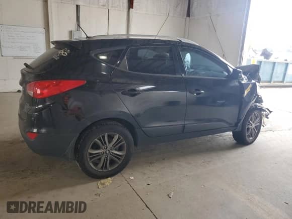 2014 Hyundai Tucson Walking Dead Edition с VIN KM8JUCAG3EU790606, выставлен на аукционе Copart как лот 71164355 с пробегом 169 552 миль миль и Списание • Salvage title. История ставок и продаж доступна на DreamBid. Изображение 3.