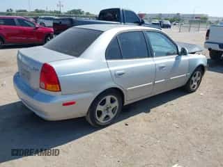 2003 Hyundai Accent GL with VIN KMHCG45C23U427238, listed as a IAAI auction lot 43412077 with 111,107 mi miles and . Bid and sale history available at DreamBid. Image 4.