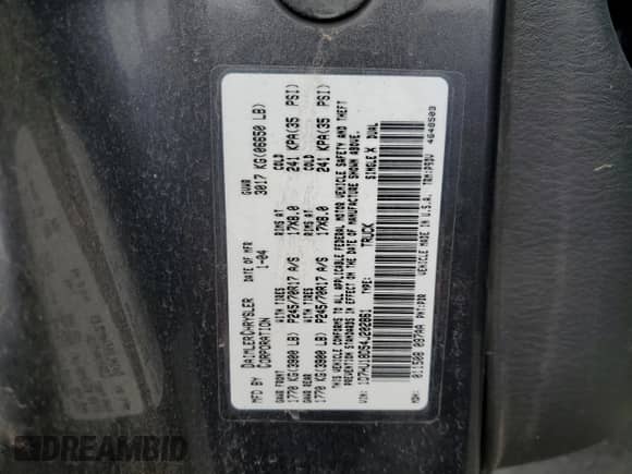 2004 Dodge 1500 SLT z VIN 1D7HU18D54J202861, wystawiony jako Copart lot #69565065 z przebiegiem 184 018 mil mil oraz Szkoda całkowita • Salvage title. Historia ofert i sprzedaży dostępna na DreamBid. Obrazek 12.
